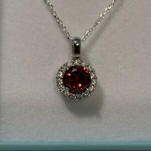 Elegant Silver Necklace with Red Gemstone Pendant